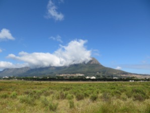 Table Mountain, obscured by clouds. As seen from the Rondebosch Common.